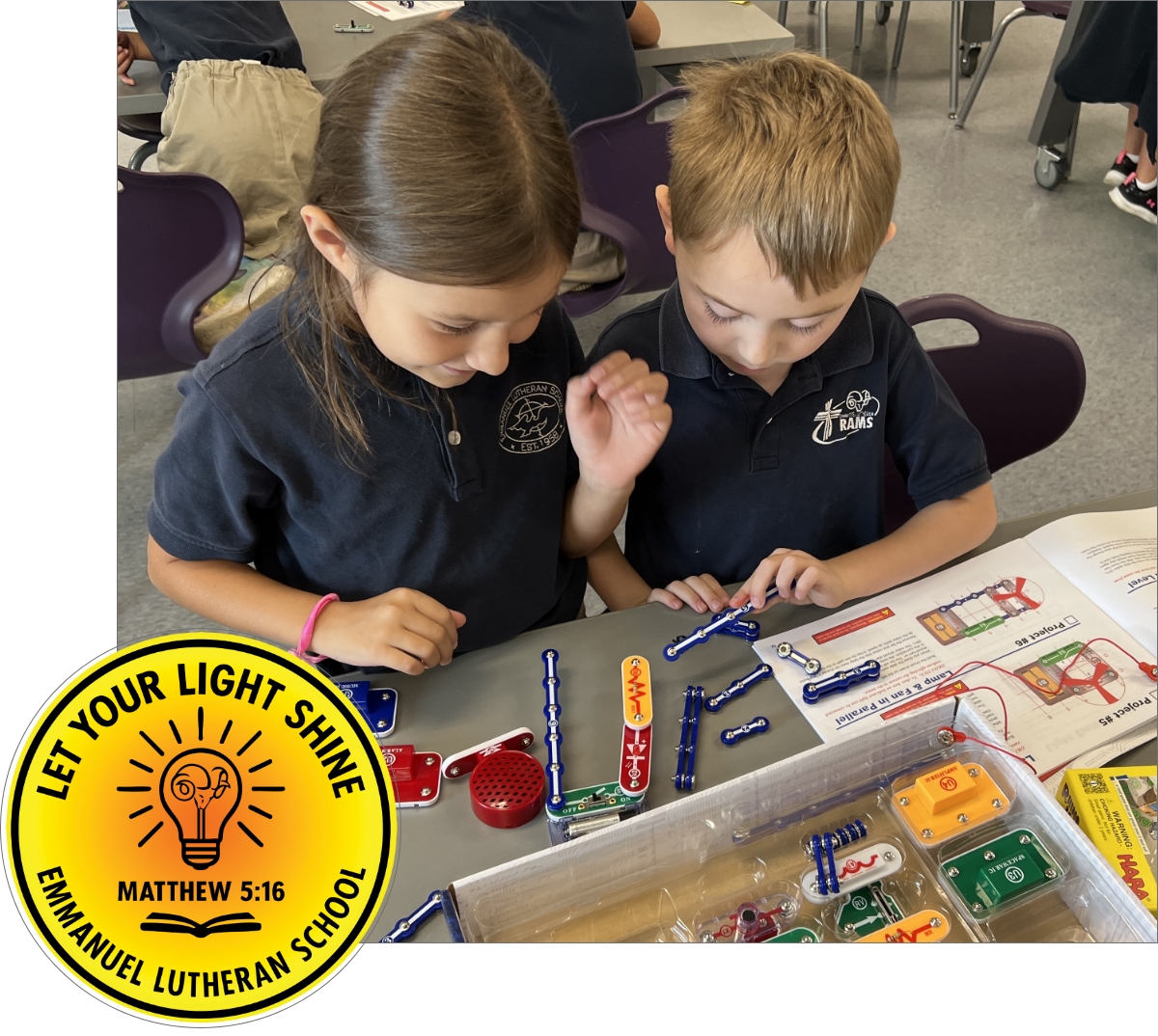 Male and Female student at a worktable